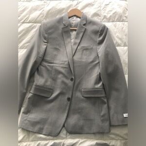 New without tags- never worn Calvin Klein blazer for Boys Size 18